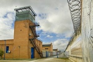 Prison in cloudy sky