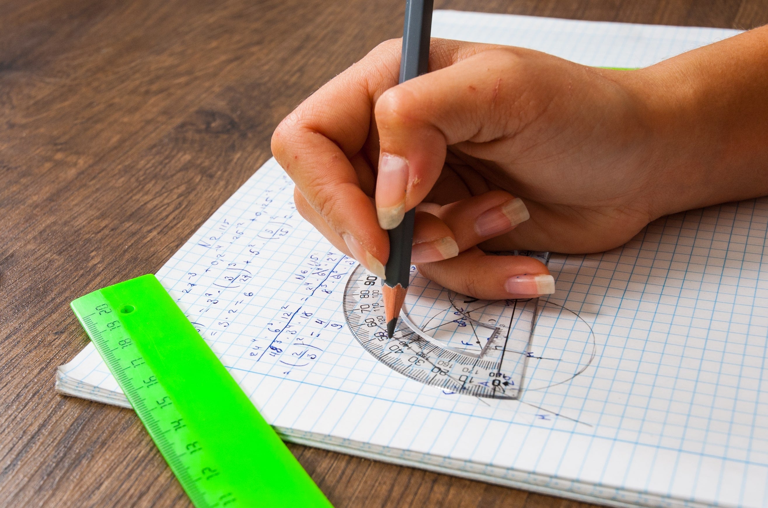 schoolgirl solves the problem of mathematics. school, education, people ...